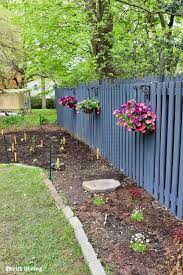 How to Use a Paint Sprayer to Paint a Wood Fence