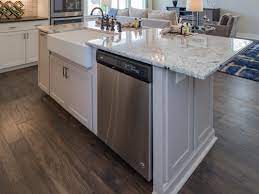 kitchen island with farmhouse sink and