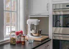 cabinet with white kitchenaid mixer