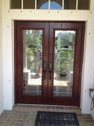 stained woodgrain fiberglass doors