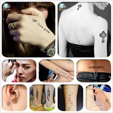 Us 3 59 10 Off Mixed 8 Sheets Tribal Tattoo Designs Black Cross Tatoo Fake Body Temporary Tattoos Skull Smile Star Electrocardiogram Tattoos In