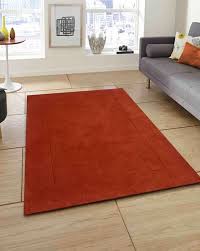 orange rugs carpets dhurries