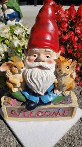 Garden Gnome On Welcome Sign With