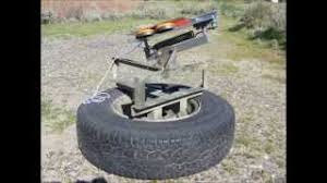 improved tire mounted clay pigeon thrower