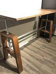 Here are some of the best electric height adjustable desks to inject some technology into your office work top. Diy Height Adjustable Sitting Standing Desk Threaded Lift Diy Standing Desk Adjustable Height Desk Standing Desk Diy Adjustable