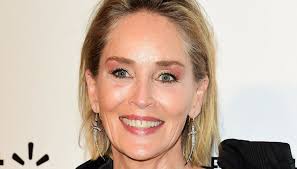 The basic instinct actress is beaming for the camera in a. Eegbr32arkzdom