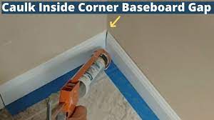 to caulk an inside corner baseboard gap