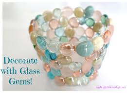 A Vase Or Candle Holder With Glass Gems