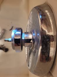 how to remove this shower faucet handle