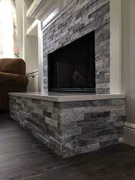 Completed Grey Stone Fireplace With