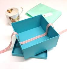 lining gift boxes with tissue