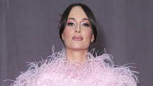 kacey musgraves wore a pink catsuit and