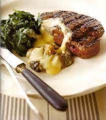 carpetbag steak with spinach and lemon