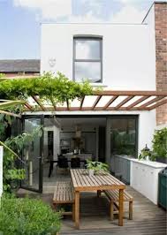 Cómo lograr un gran diseño de exteriores y terrazas para tu hogar. Cocinas Abiertas Al Jardin Lovecooking Techo De Patio Diseno De Terraza Decoracion De Patio