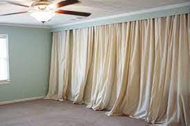 Cover A Wall With Curtains