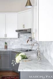 White subway tile is a good fit for a white color scheme in your kitchen but note that tile is more difficult to clean than a slab. 8 Backsplash For White Cabinets Ideas Kitchen Design White Kitchen Cabinets Kitchen Remodel