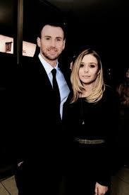 Civil war premiere in london on tuesday in some photos obtained by et, evans looked mesmerized by olsen's exposed cleavage as he was caught peeping at them during group shots on. 30 Adorable Images Of Chris Evans And Elizabeth Olsen Together Comic Books Beyond