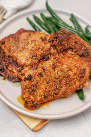 When oven is 375 degrees and pan is scorching hot (but not smoking), carefully swirl olive oil in pan and heat until shimmery. Easy Oven Baked Pork Chops Recipe The Dinner Bite