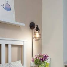 black wire frame wall sconce light