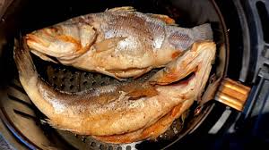 The only way our mom would get us to eat fish as kids was when she would pan fry king fish and serve it to us with ketchup and a little pepper sauce. Air Fryer Whole Fish Recipe How To Cook Whole Fish In The Air Fryer Youtube