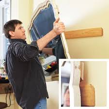 how to hang heavy objects on drywall