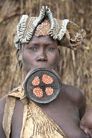mursi woman with lip plate stock
