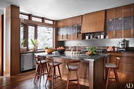 We love the countertop that can also serve as a dining table. 18 Classic Wood Kitchens Architectural Digest