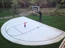 a backyard half court with striping is