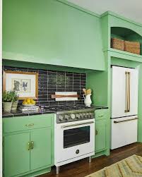 The term apothecary comes from the pharmaceutical world, as these cabinets were primarily used by doctors and. Vintage Avocado Green Kitchen Cabinets With Glossy Black Tiled Countertops Vintage Kitchen