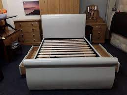 Dreams Double Leather Scroll Sleigh Bed