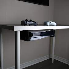 The large compartment is just the right size for storing excess papers or for use as a handy shelf to hold electronics out of the way as they charge. Ps5 Under Desk Mount Ggmounts