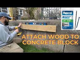 attach wood to cement block concrete