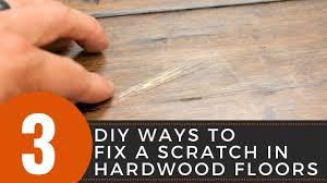 fix a scratch in hardwood floors