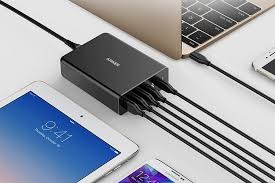 This hub provides a full 100w charge, enough to power up a macbook at top speed. Anker Powerport 5 Usb Type C Hub Clad