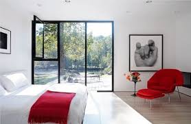 Pillows on the bed have the same pattern, and a red ottoman, curtains, floor lamp, and seating add more touches of color. Red Accents In Bedrooms 34 Stylish Ideas Digsdigs