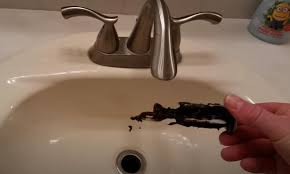 To take it out, remove the screws from the faceplate of the trip lever, then carefully pull the faceplate away. 9 Easy Steps To Remove A Bathroom Sink Stopper