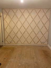 couple who created wall panelling in