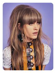 A flattering haircut and a beautiful hairstyle are affordable at any age. 70s Style Long Hair Novocom Top
