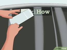 Use a credit card to rub and smooth the decal onto the window. How To Add Custom Decals To A Car 13 Steps With Pictures