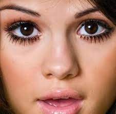 Pull down on your lower eyelid with your free hand and look up as you draw to make it easier. 56 Make Eyes Look Bigger Ideas Makeup Tips Eye Makeup Bigger Eyes