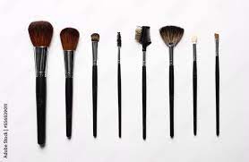 diffe makeup brushes on white