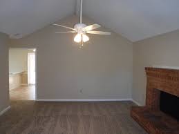 ceiling fan with view of kitchen