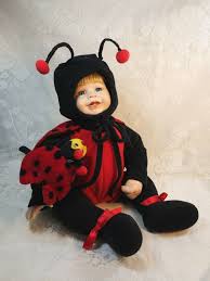 ladybug costumed baby doll porcelain