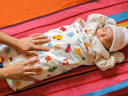 when to stop swaddling is my baby ready