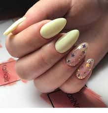 Light Yellow Nails With Stars