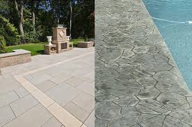 stamped concrete vs pavers triad