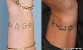 The tattoo is put underneath her current inkings on her wrist, is a guide of the world. Lily Allen S Tattoos Meanings Steal Her Style Inner Wrist Tattoos Tattoos Wrist Tattoos