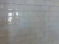 glass subway tile with gray grout