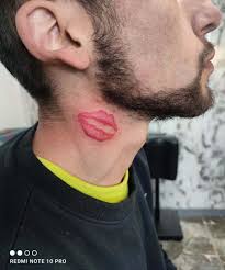 a tattoo of lips on someone s neck mean