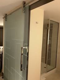 Frosted Sliding Glass Door To Bathroom